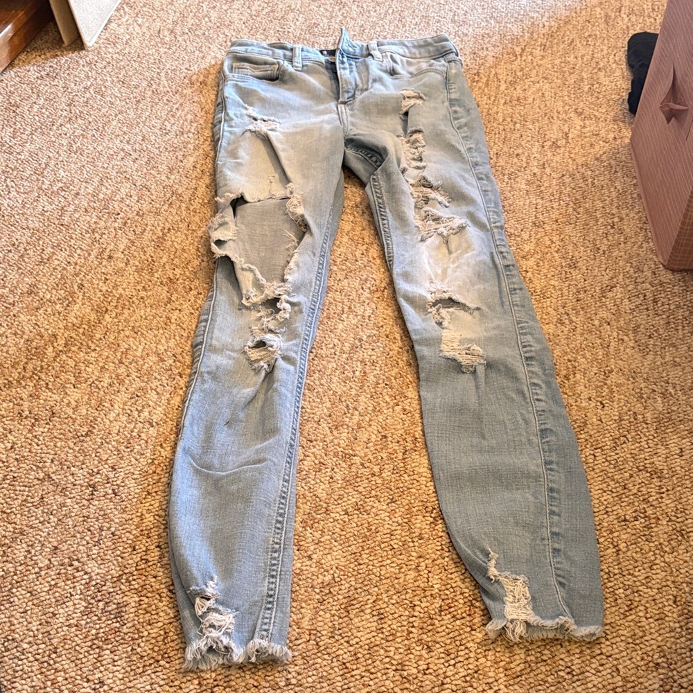 Trendy Distressed Hollister Women's Hi-Rise Super Skinny Jeans in Light Blue